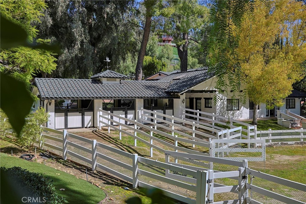 5839 Jed Smith Road Hidden Hills, CA 91302 - Photo 44 of 46 a view of a house with backyard and sitting area