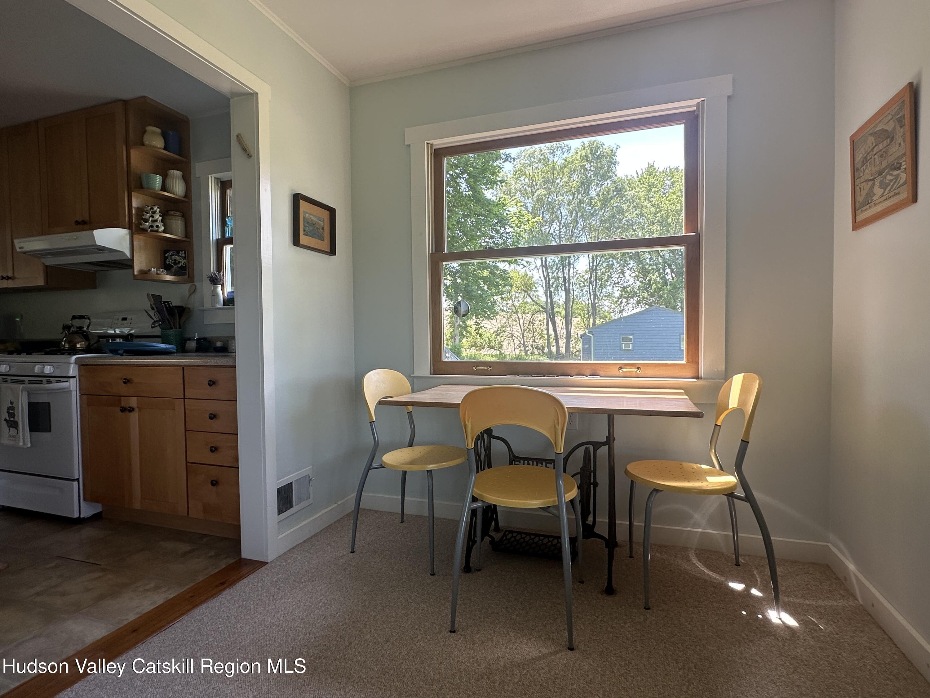 1492 County Road Copake, NY 12516 - Photo 5 of 34 a dining room with furniture and window