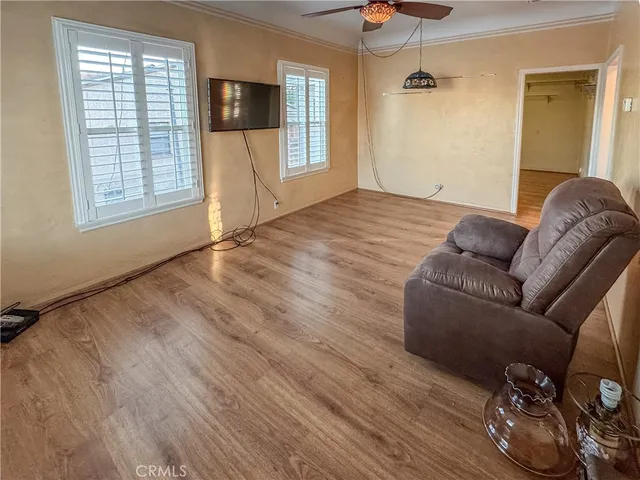 a kitchen with stainless steel appliances granite countertop a refrigerator and cabinets