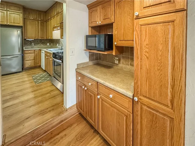 a bathroom with a sink a toilet and a shower