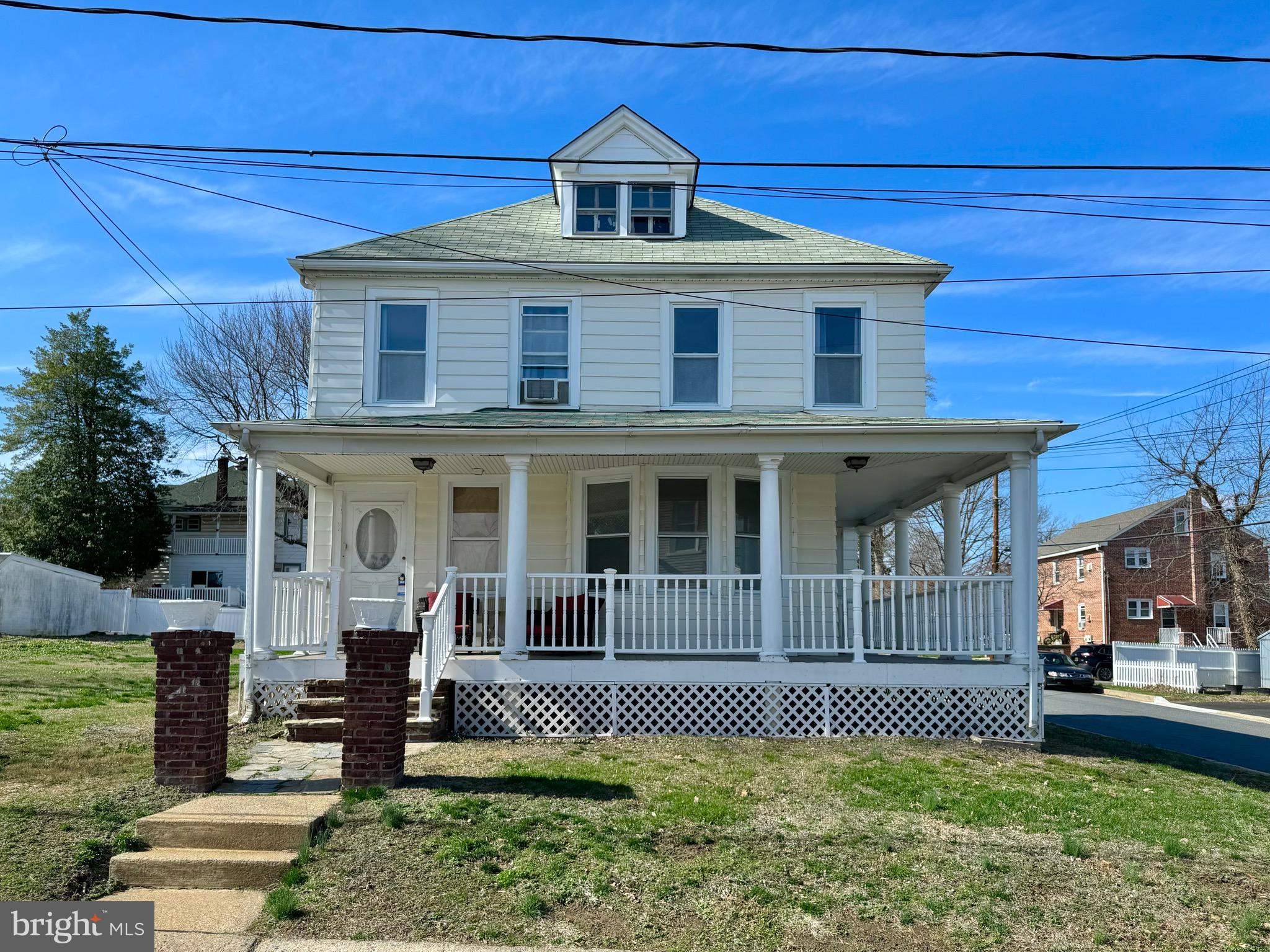 1121 Rosedale Avenue Wilmington, DE 19809 - Photo 2 of 37 a front view of a house with garden