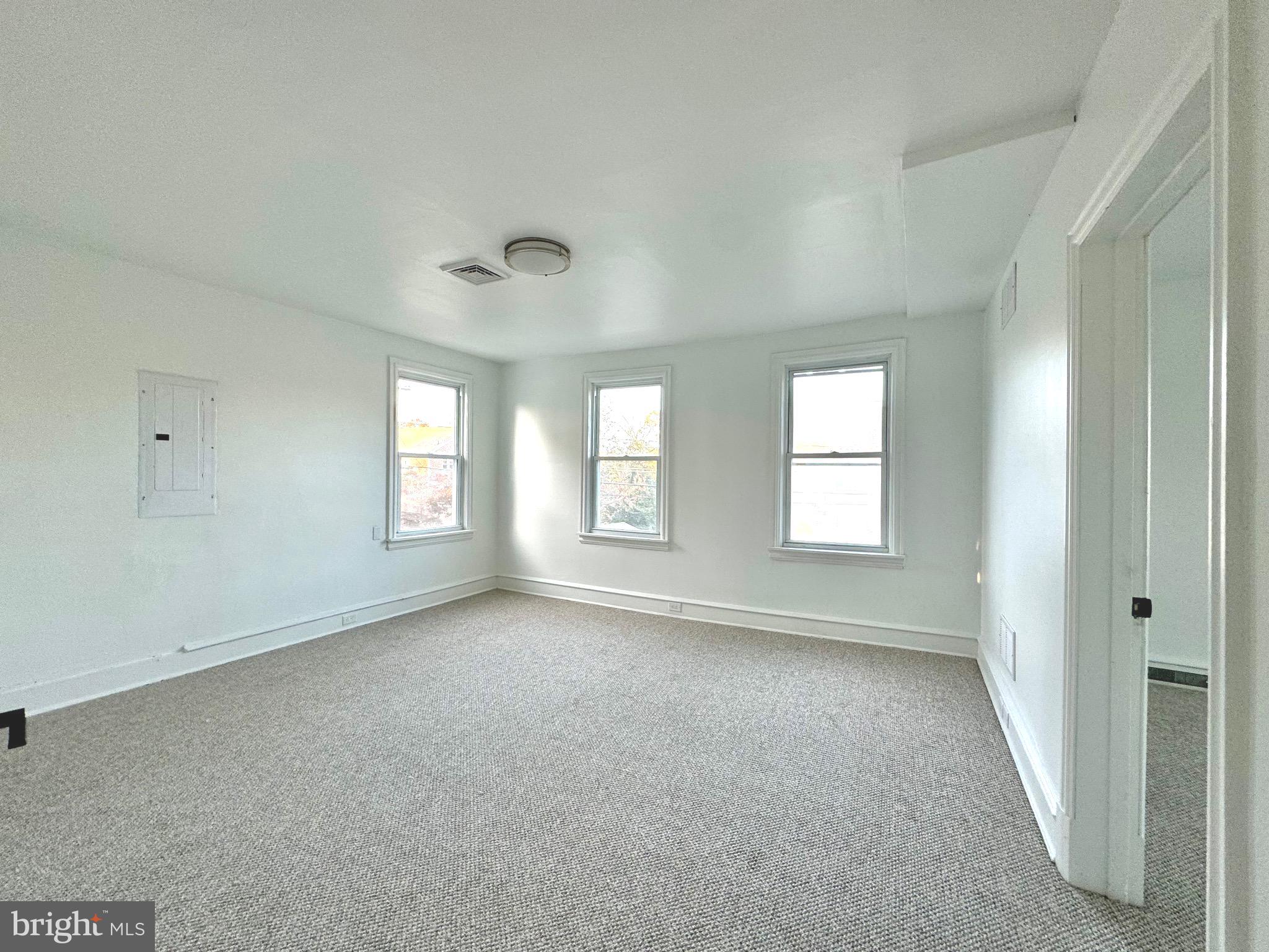 1121 Rosedale Avenue Wilmington, DE 19809 - Photo 23 of 37 a view of an empty room with a window