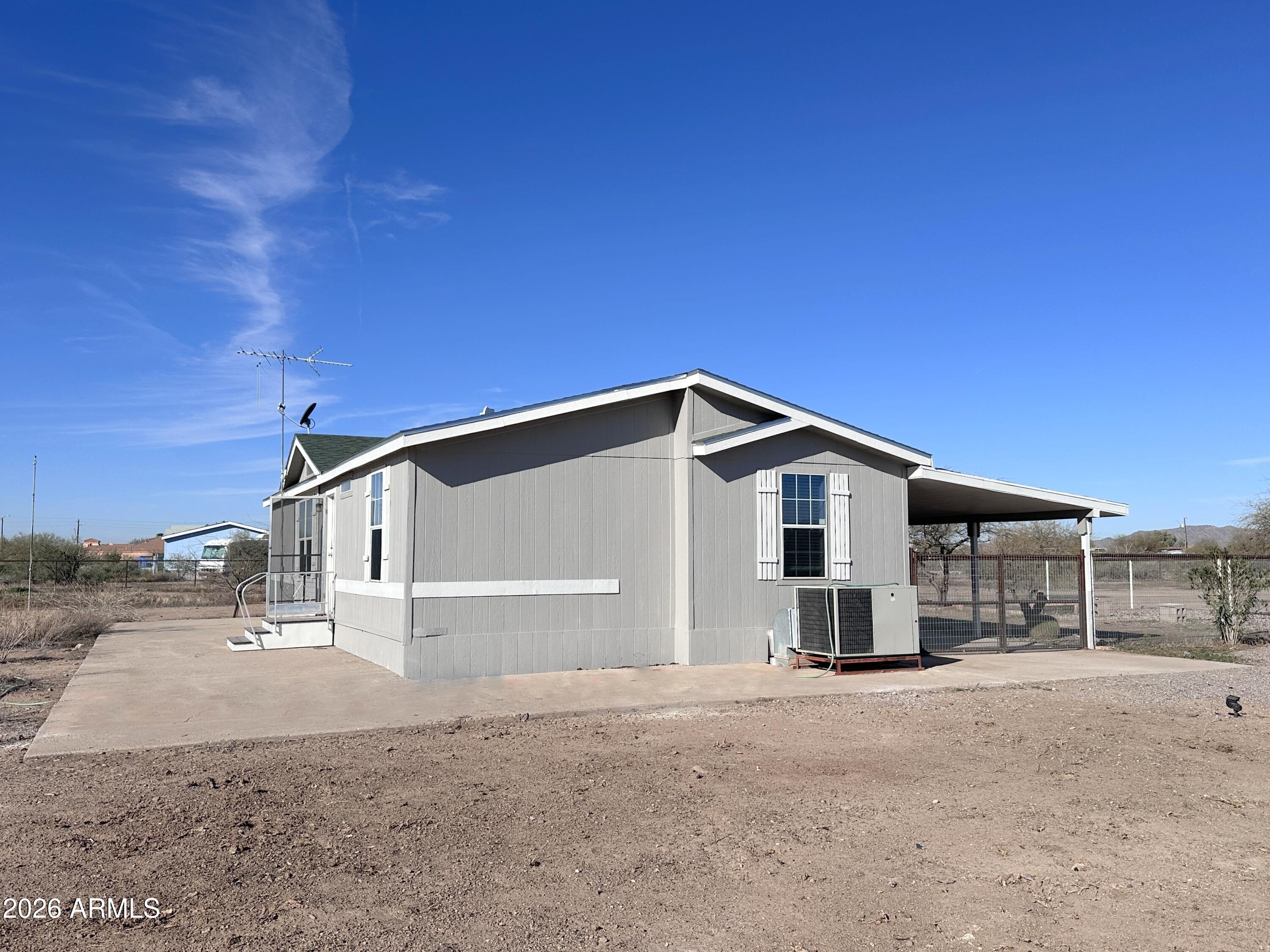 7736 West Alsdorf Road Arizona City, AZ 85193 - Photo 3 of 45 a view of a house with a backyard