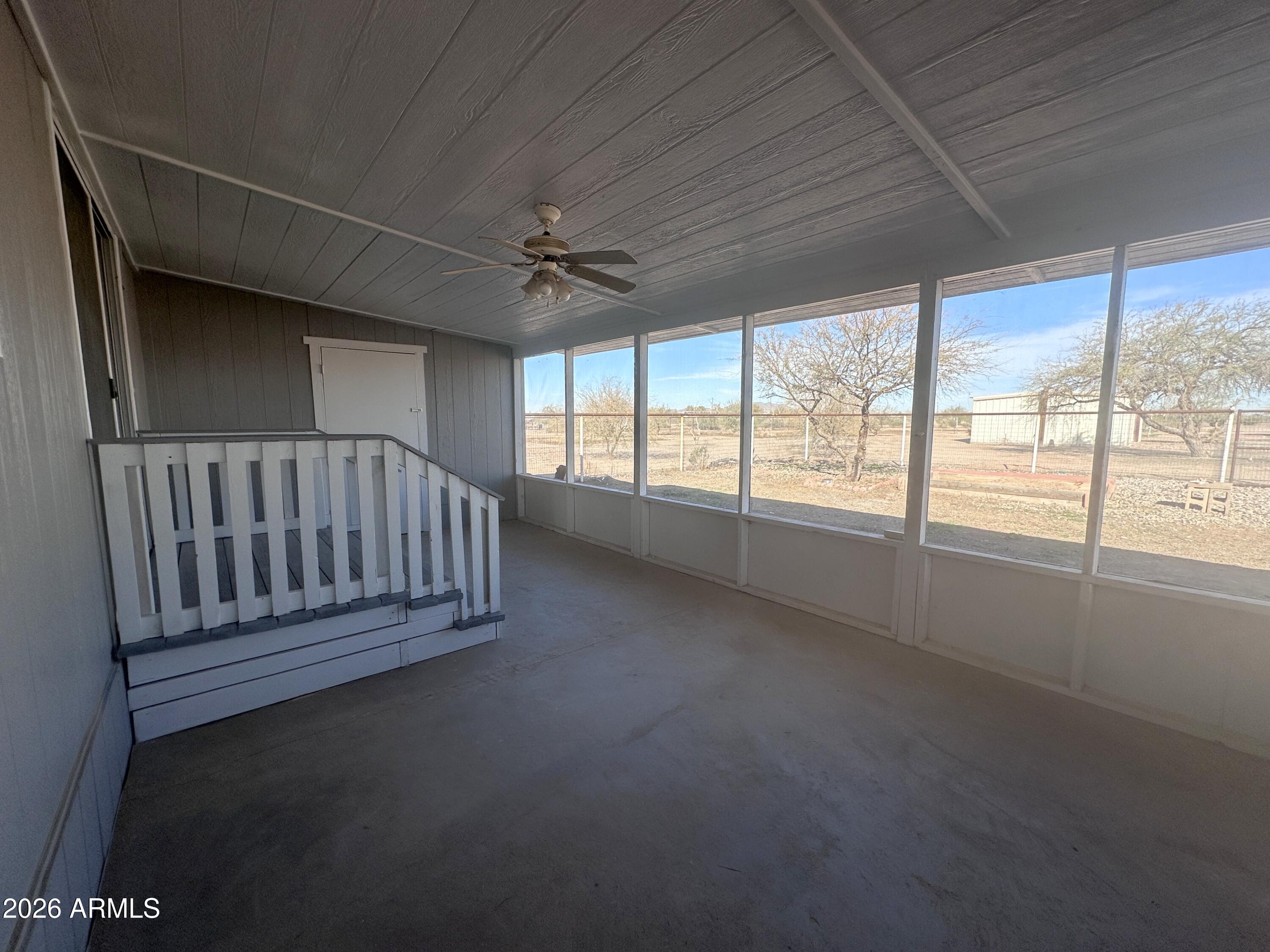 7736 West Alsdorf Road Arizona City, AZ 85193 - Photo 31 of 45 a view of an empty room with a window