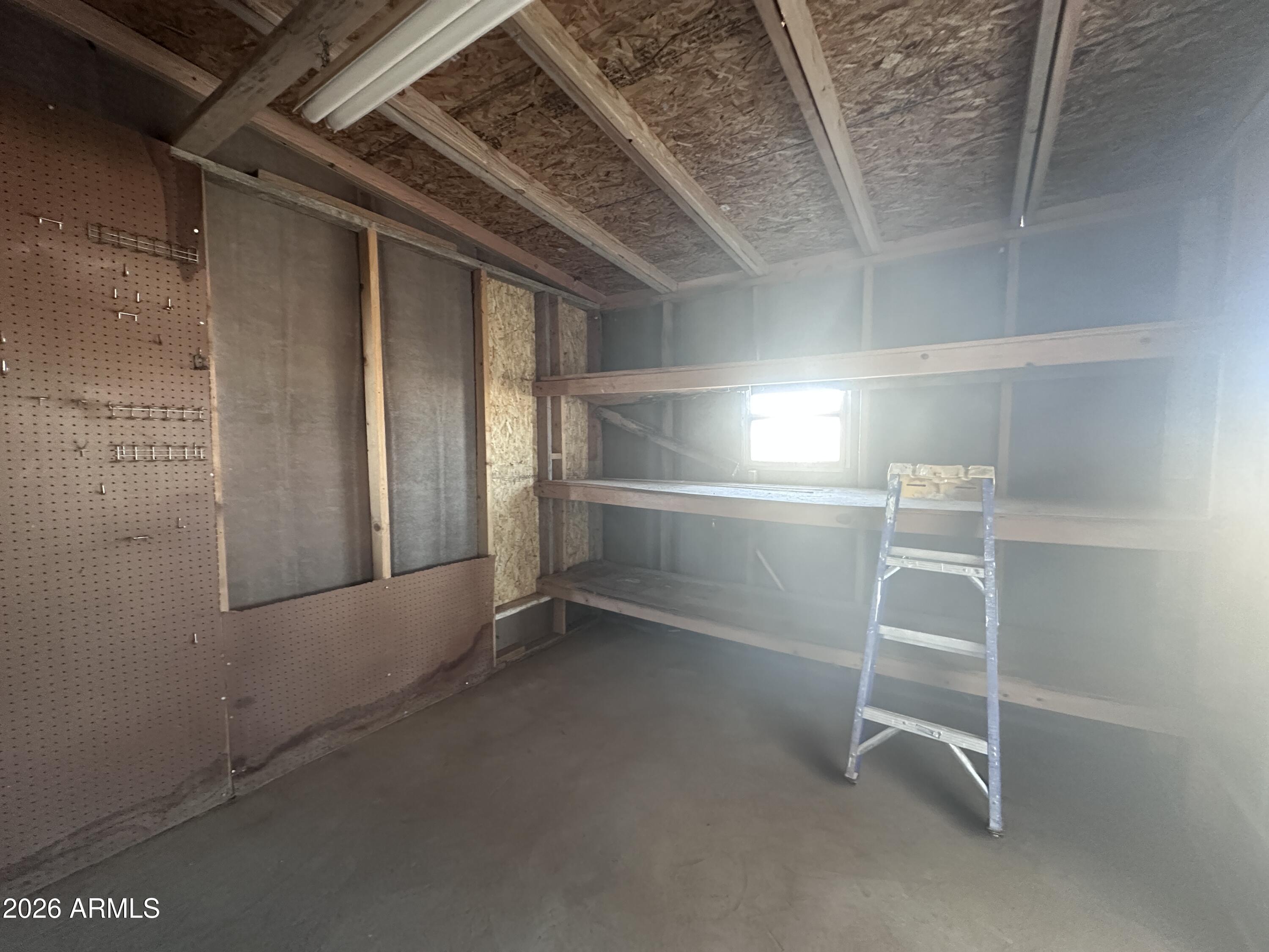 7736 West Alsdorf Road Arizona City, AZ 85193 - Photo 34 of 45 a view of an empty room with a window