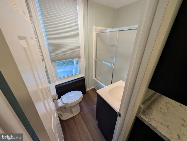a bathroom with a sink and toilet