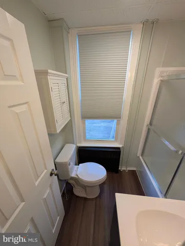 a bathroom with a sink and a toilet