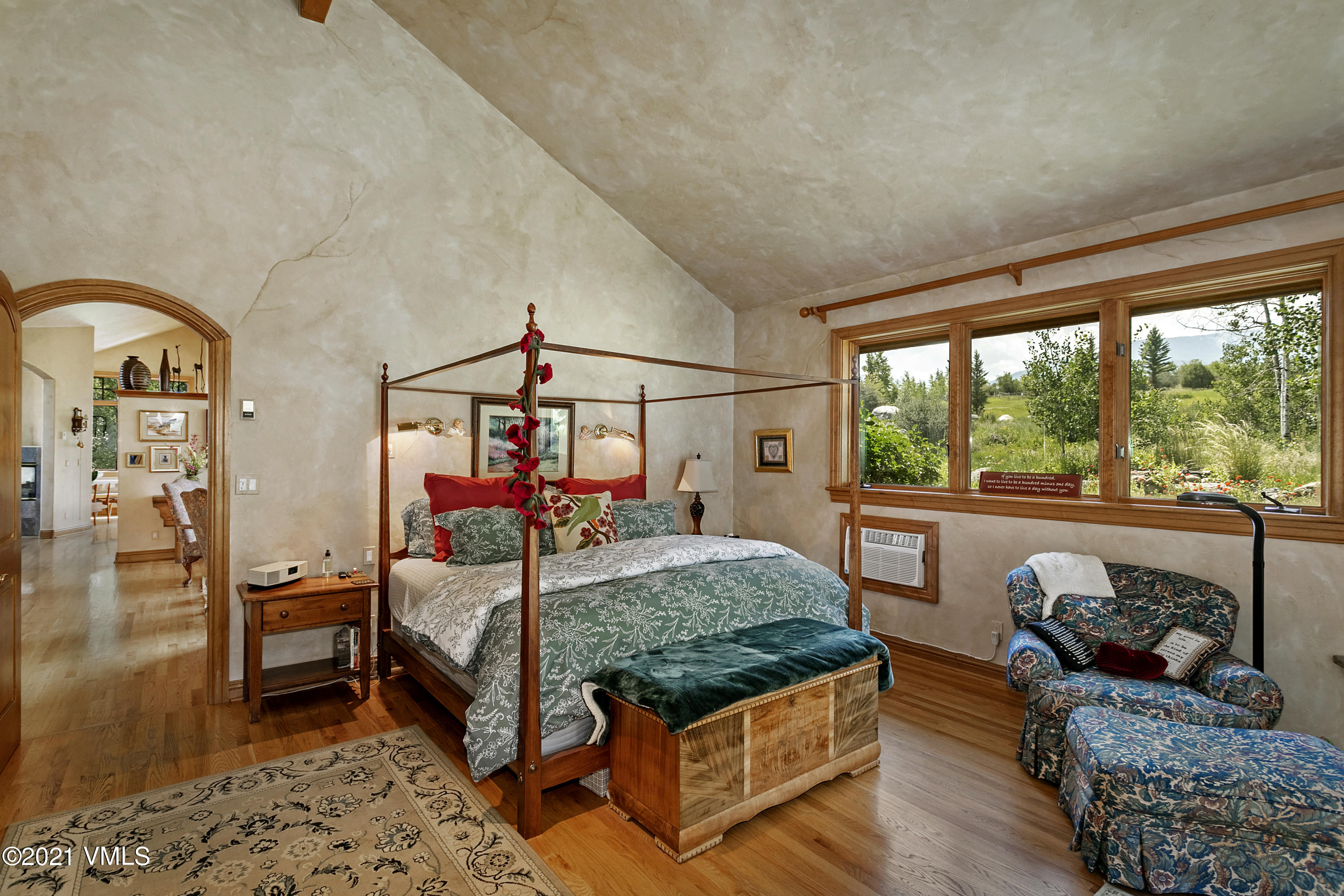 755 Eagle Crest Road Edwards, CO 81632 - Photo 19 of 56 a bedroom with a bed window and couch