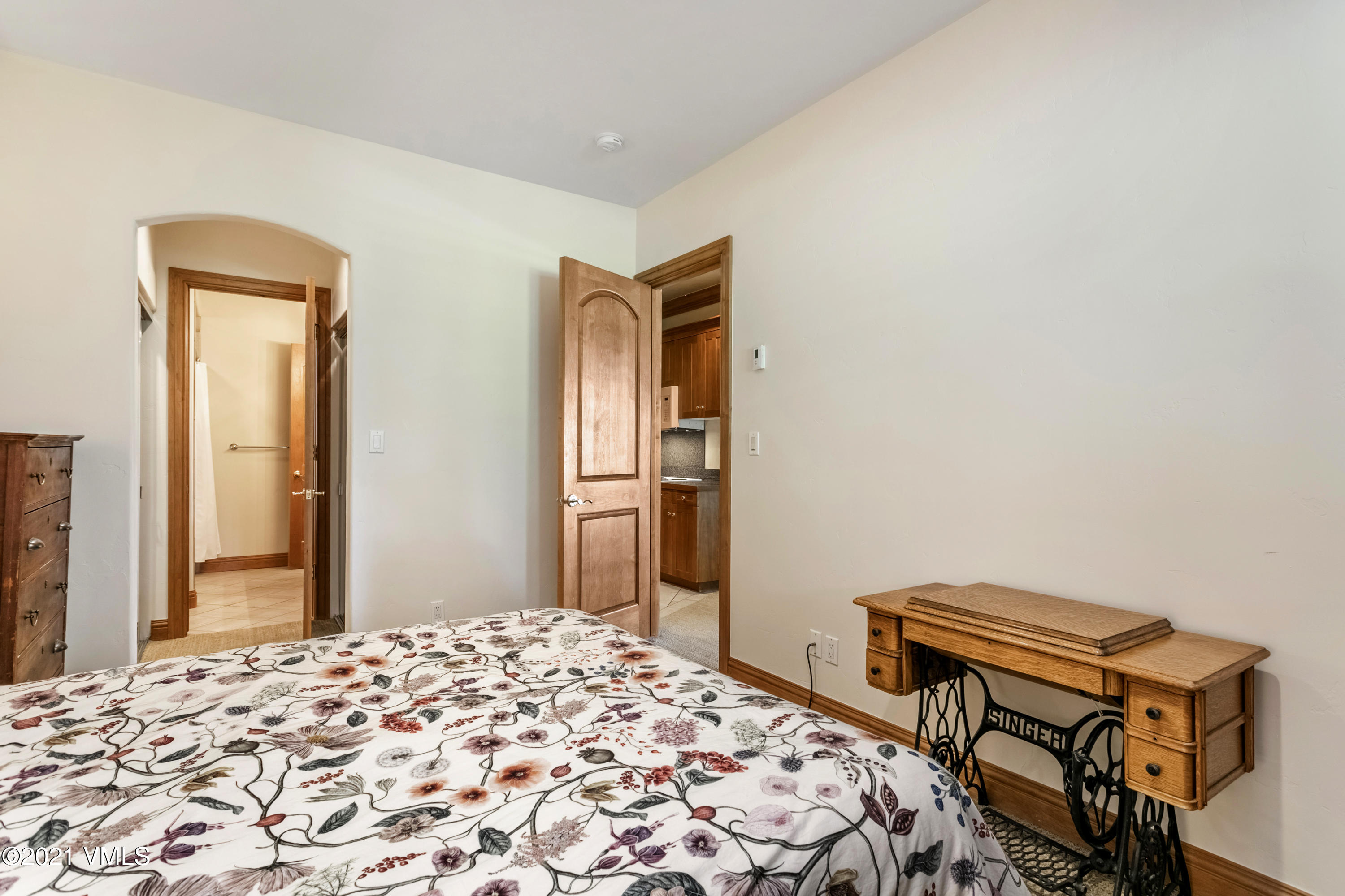 755 Eagle Crest Road Edwards, CO 81632 - Photo 33 of 56 a bedroom with a bed and a dresser