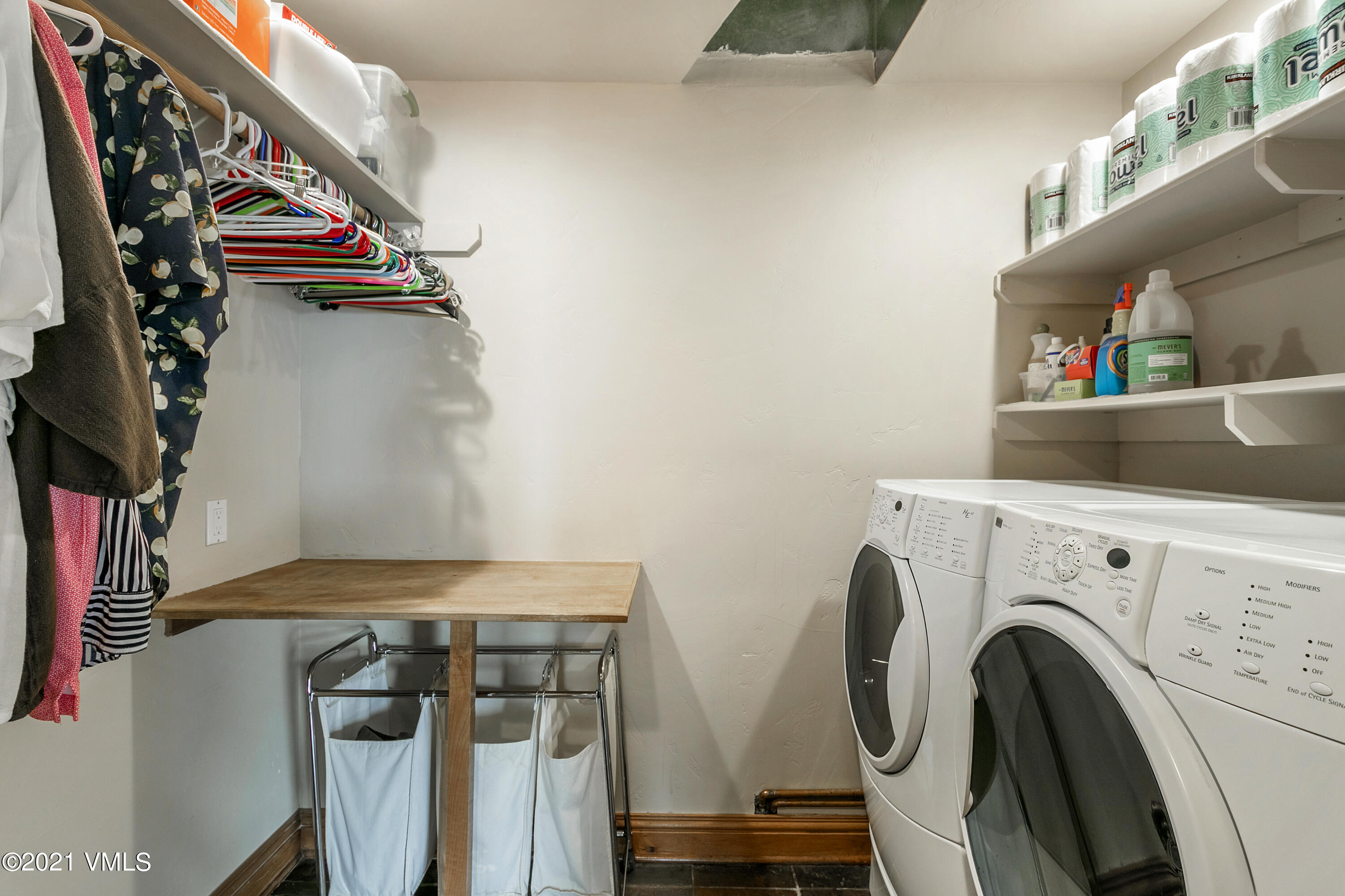 755 Eagle Crest Road Edwards, CO 81632 - Photo 40 of 56 a view of walk in closet with clothes and shoes