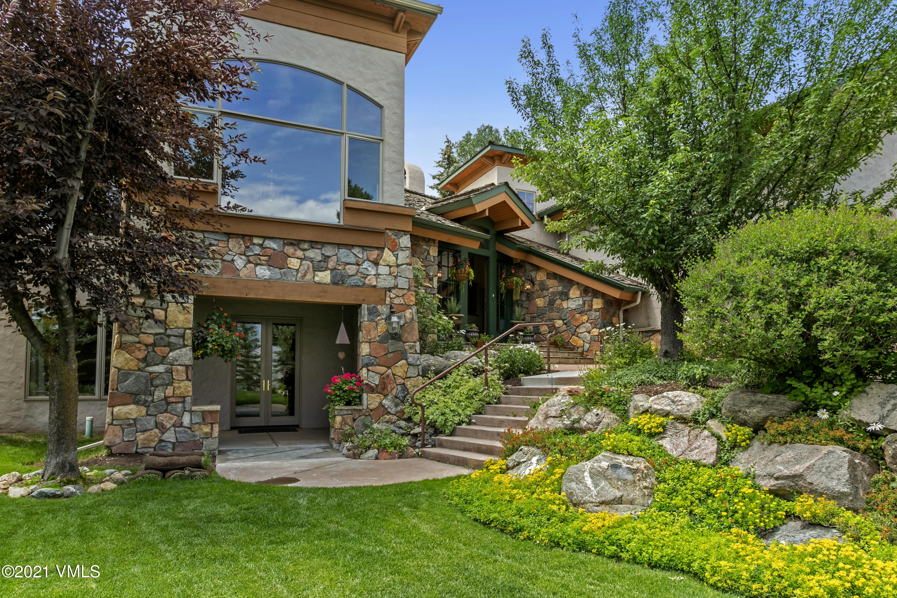 755 Eagle Crest Road Edwards, CO 81632 - Photo 4 of 56 front view of a house with a yard