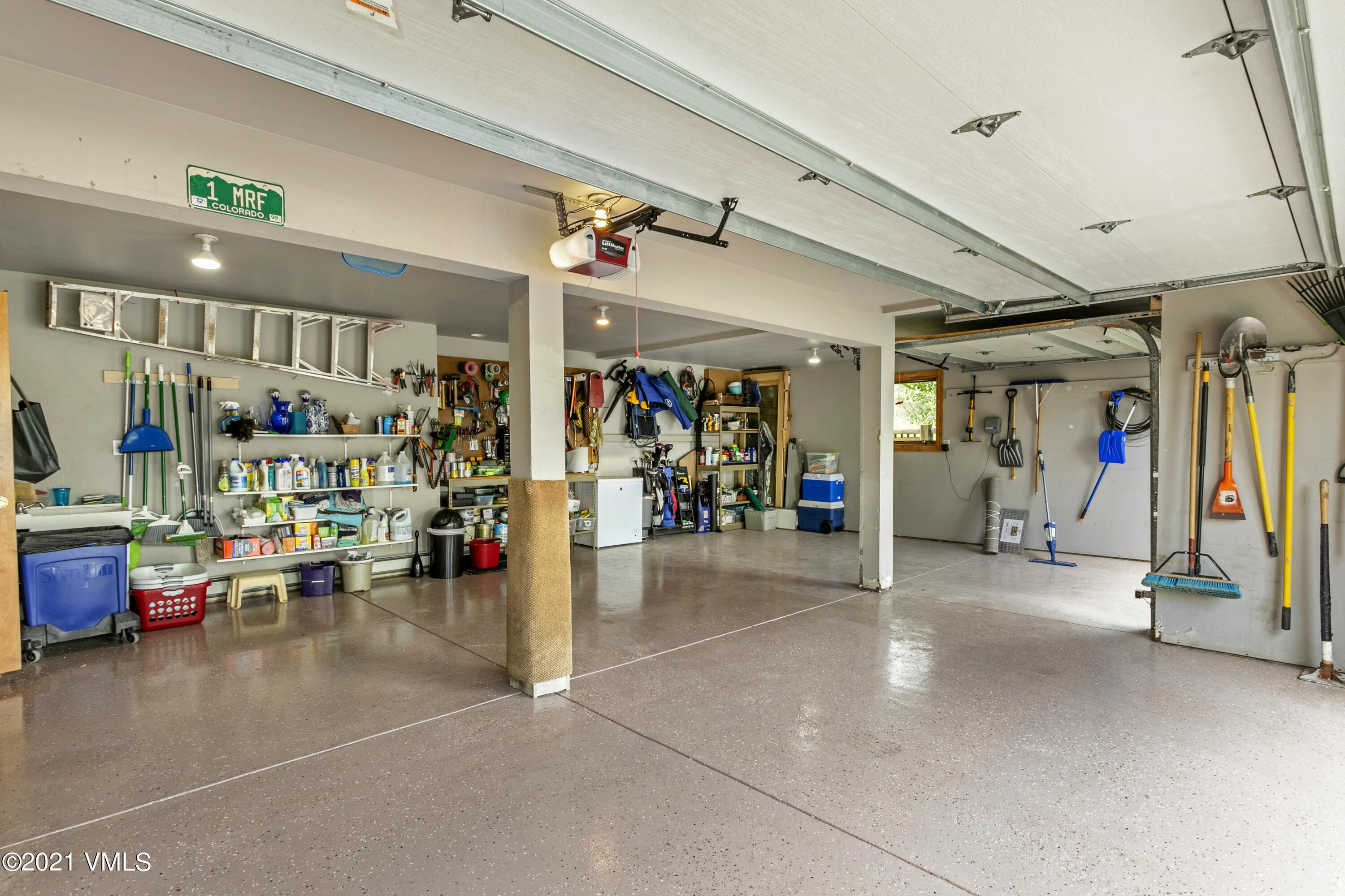 755 Eagle Crest Road Edwards, CO 81632 - Photo 41 of 56 a view of a garage with gym equipment