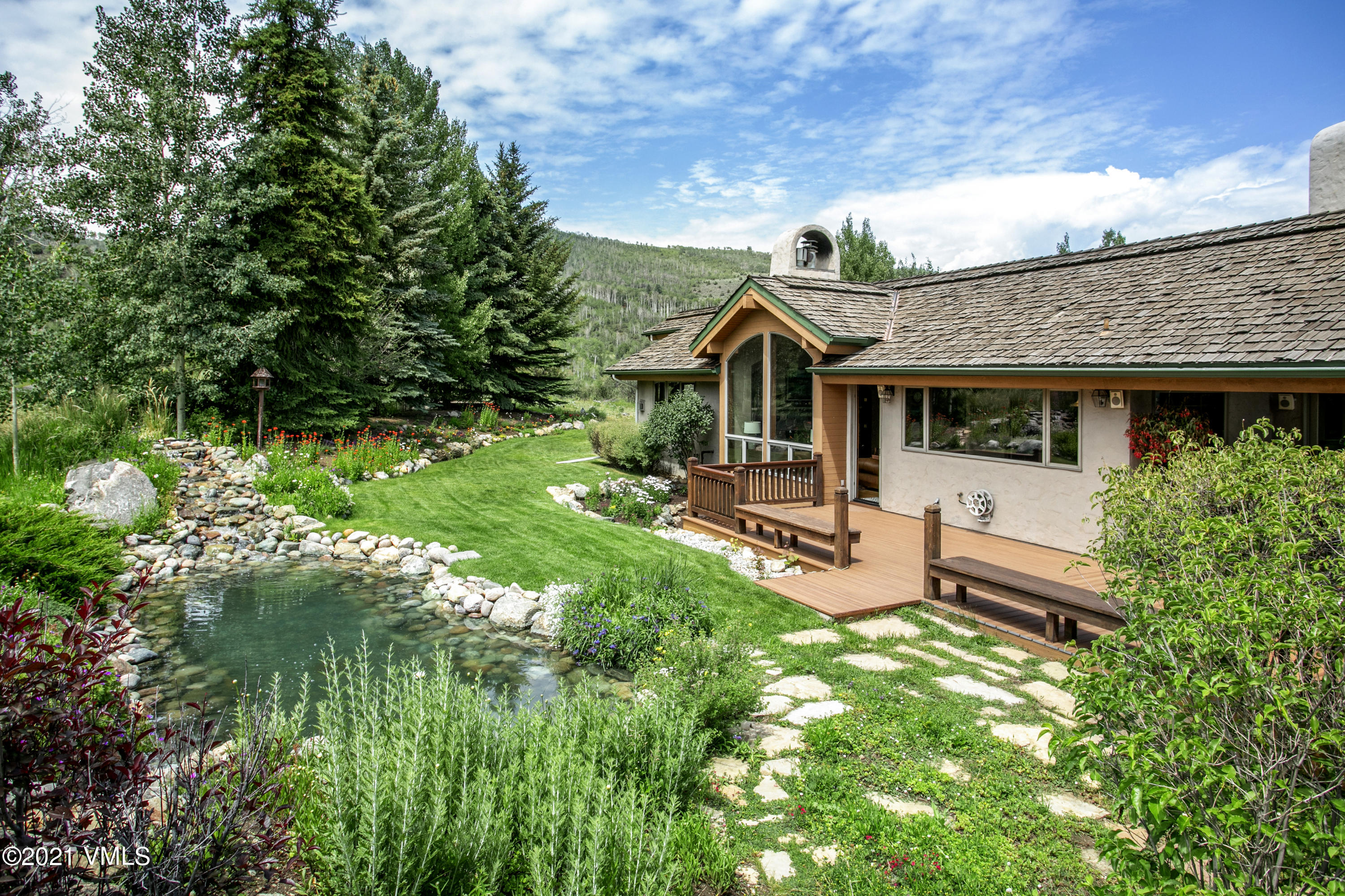 755 Eagle Crest Road Edwards, CO 81632 - Photo 46 of 56 a front view of a house with garden