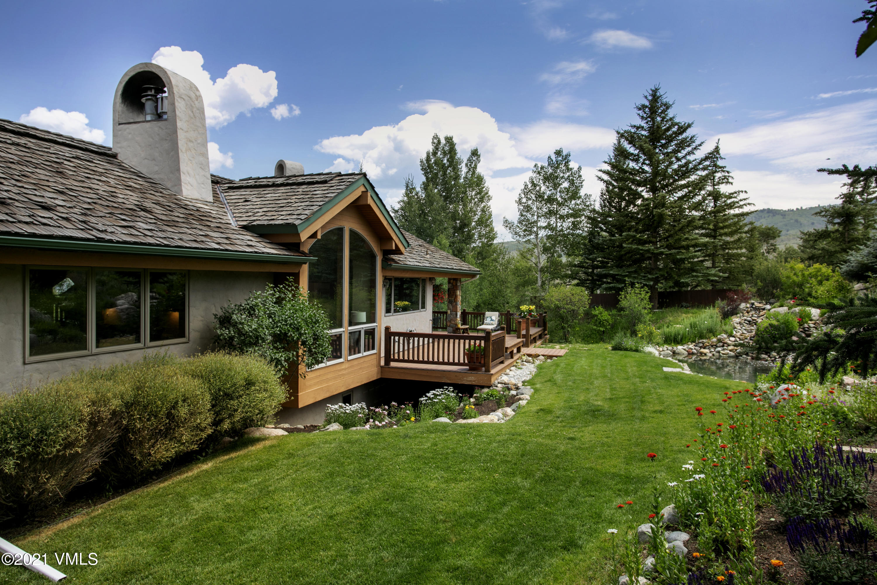 755 Eagle Crest Road Edwards, CO 81632 - Photo 47 of 56 a front view of house with a garden