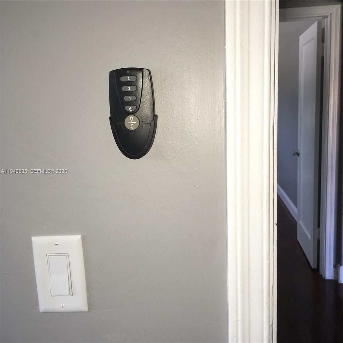 661 Southwest 11th Street, Unit 22W Miami, FL 33129 - Photo 12 of 22 a view of a hallway with window