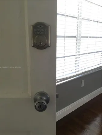 a view of a window in an empty room