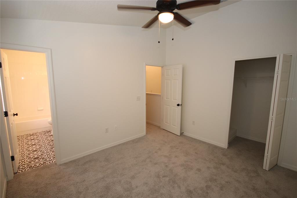 1575 Blue Magnolia Road Brandon, FL 33510 - Photo 10 of 22 an empty room with fan