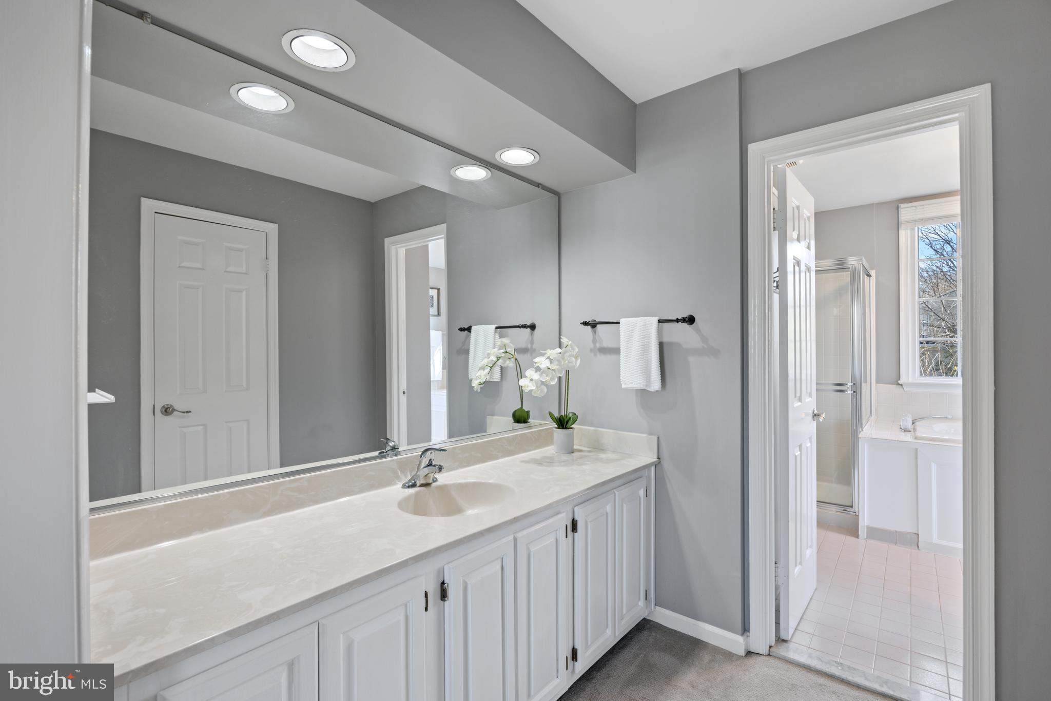 8255 Colling Ridge Court Alexandria, VA 22308 - Photo 21 of 49 Separate vanity w/ sink outside bathroom