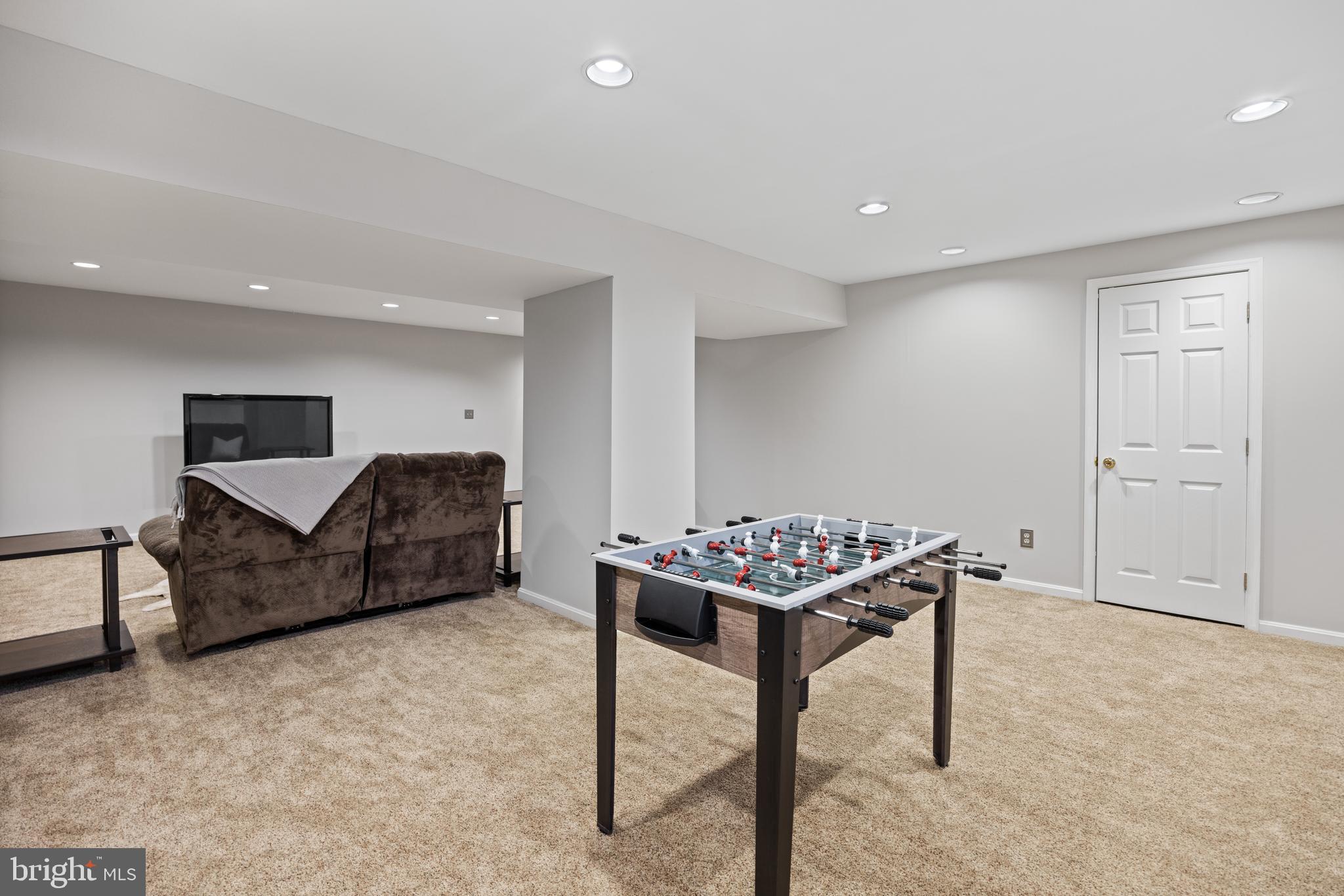 8255 Colling Ridge Court Alexandria, VA 22308 - Photo 36 of 49 Basement rec room
