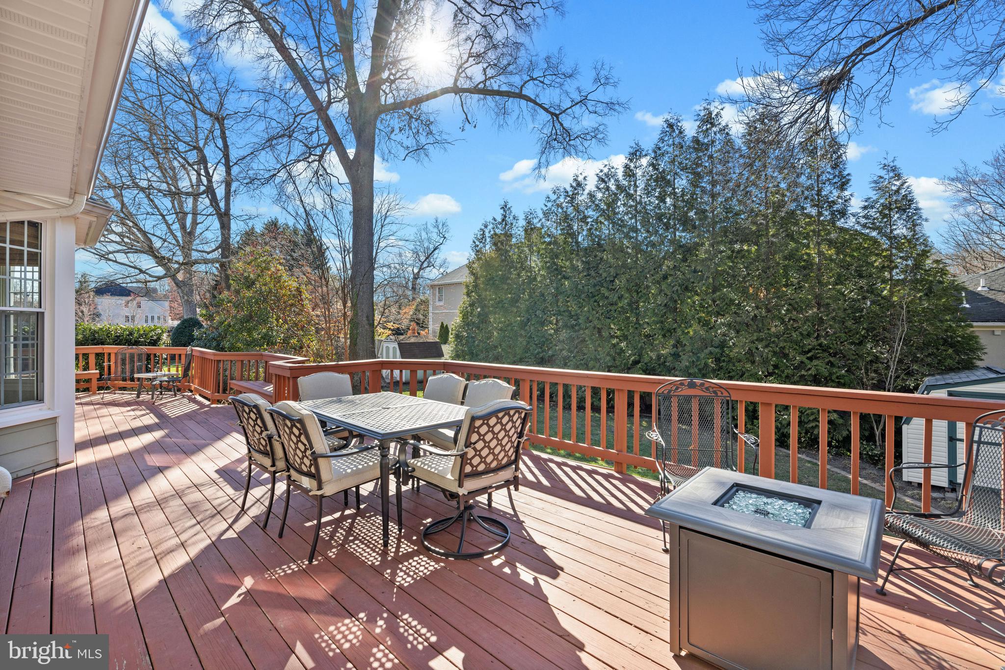 Sun-filled deck overlooking the backyard