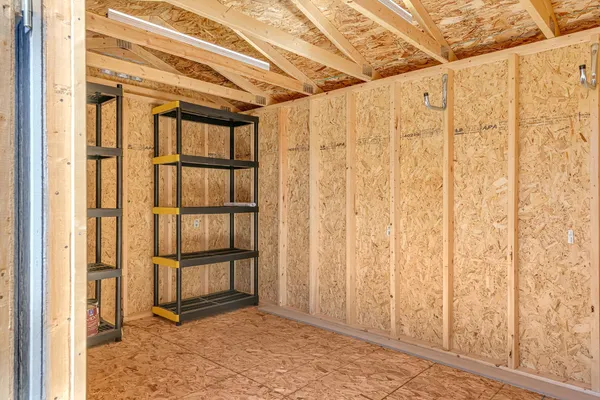 a view of storage and utility room with utility room