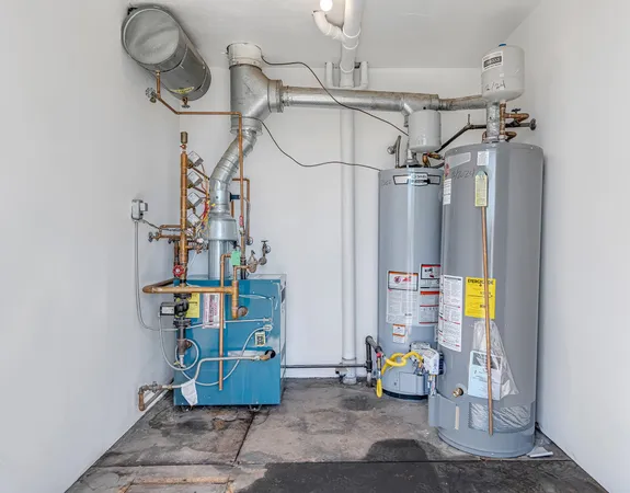 a utility room with cabinets