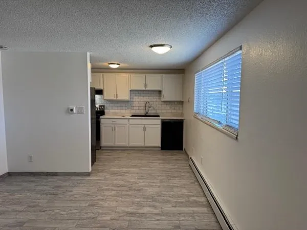 an empty room with windows