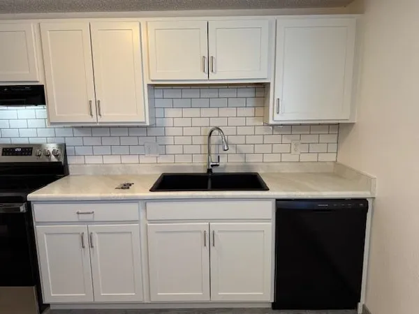 a car parked in front of a house