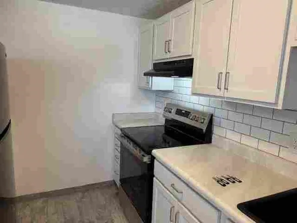 a view of a backyard of the house