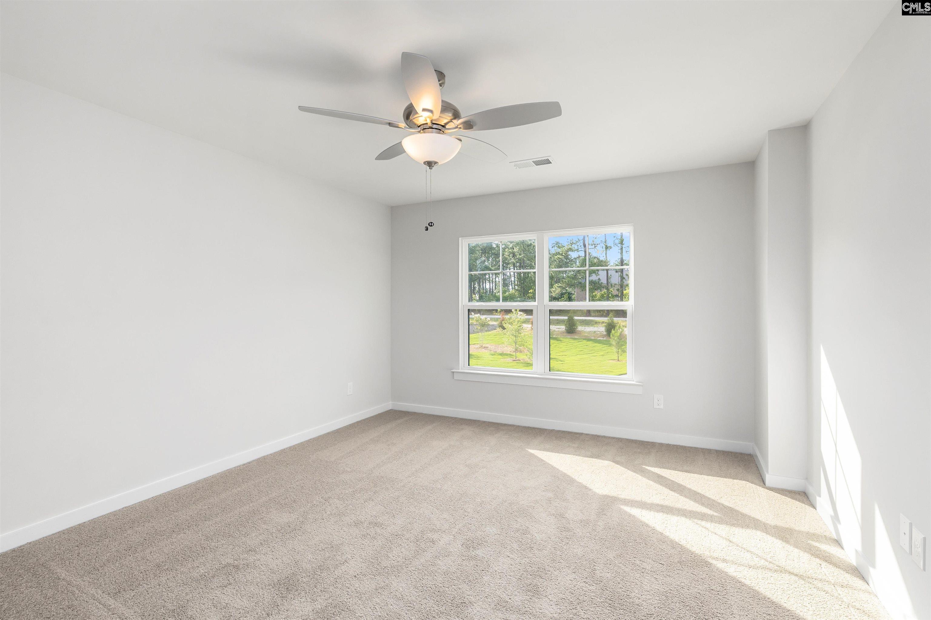 32 Fawn Spot Court Elgin, SC 29045 - Photo 16 of 28 a view of an empty room with a window