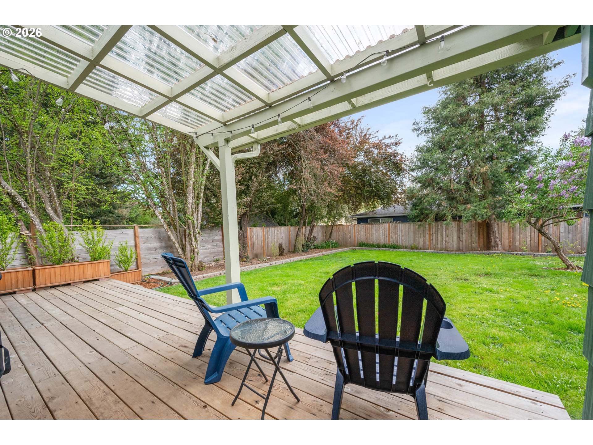 1280 Bailey Avenue Eugene, OR 97402 - Photo 29 of 42 a view of a chairs and table in patio with a backyard