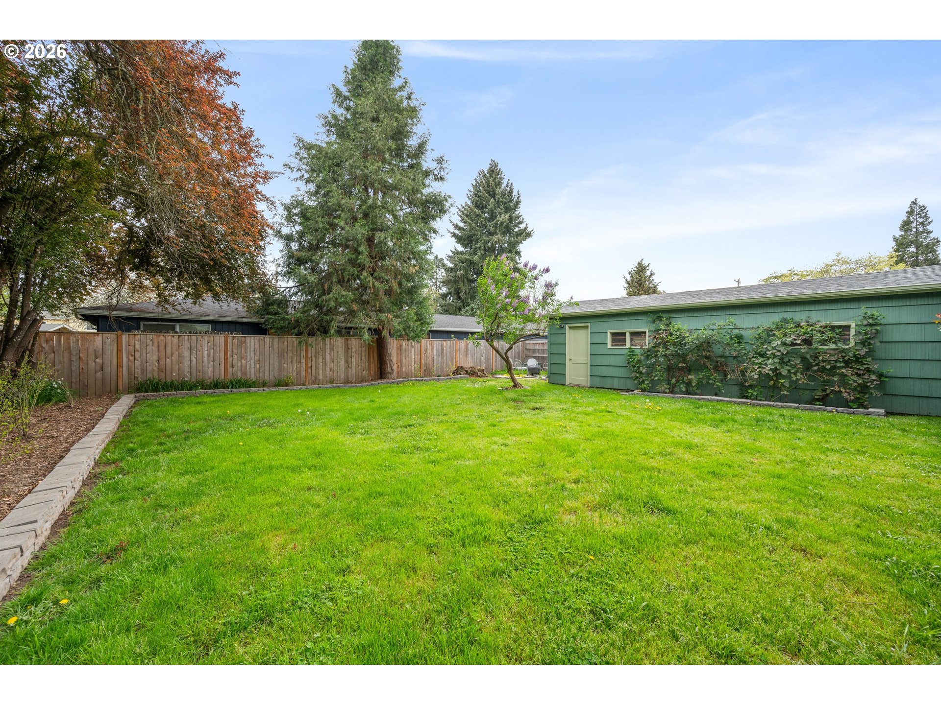1280 Bailey Avenue Eugene, OR 97402 - Photo 34 of 42 a view of yard with grass and wooden fence