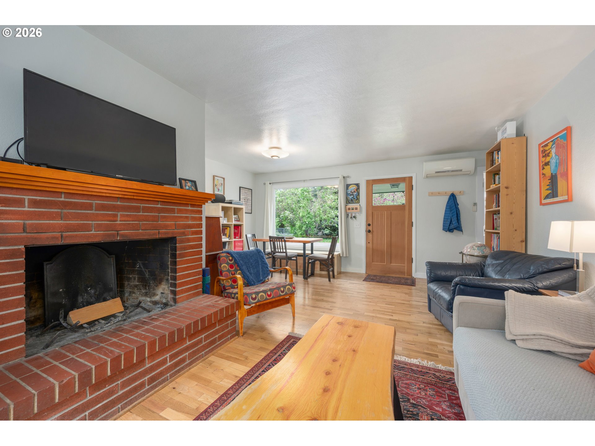 1280 Bailey Avenue Eugene, OR 97402 - Photo 8 of 42 a living room with furniture and a fireplace