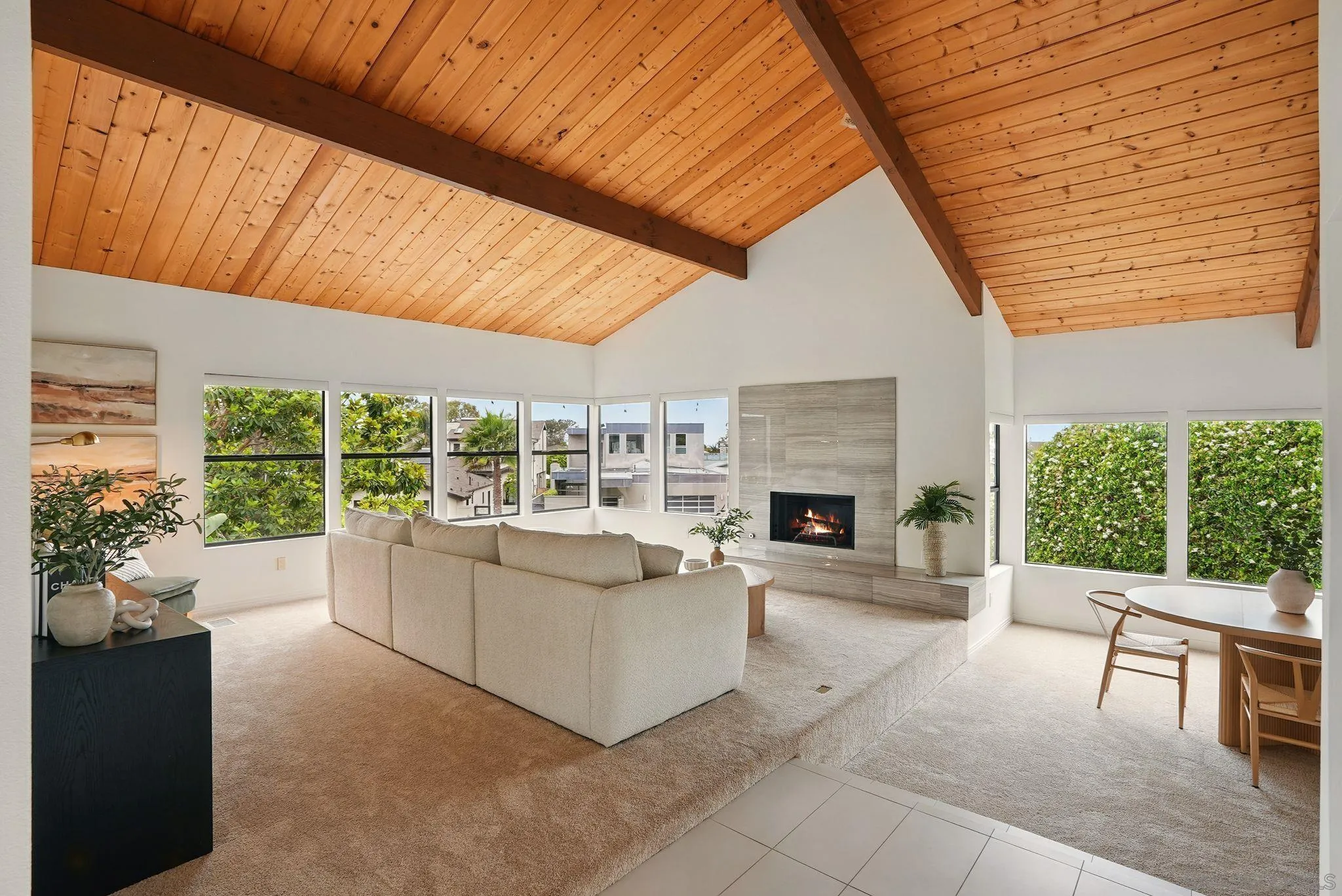 13883 Recuerdo Drive Del Mar, CA 92014 - Photo 20 of 45 a living room with fireplace furniture and a large window