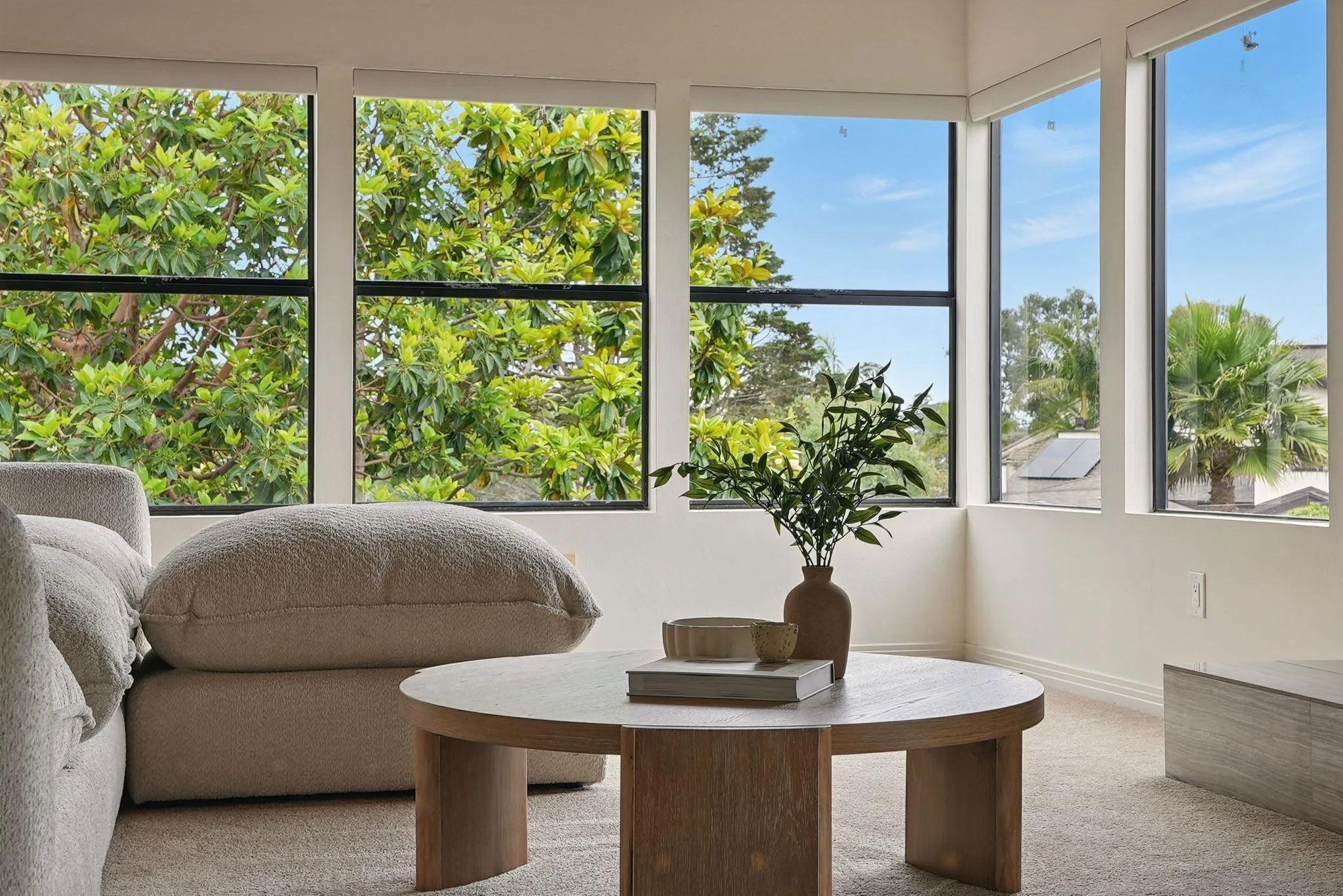 13883 Recuerdo Drive Del Mar, CA 92014 - Photo 23 of 45 a living room with couches table and a potted plant
