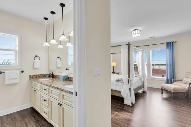 a bathroom with a glass shower door