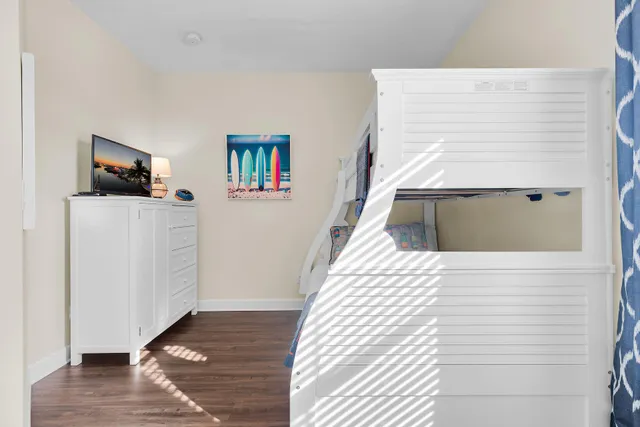 a view of a house with pool and a yard