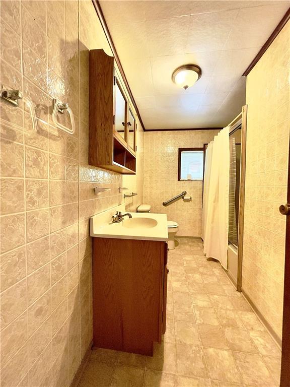 309 Moscow Road Waynesburg, PA 15370 - Photo 10 of 25 a bathroom with a sink mirror and shower