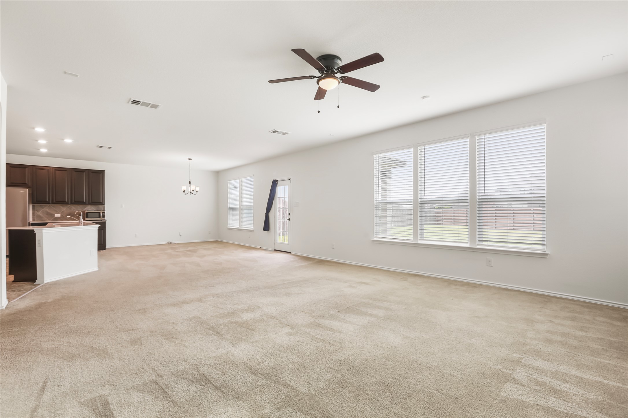 18917 Rushmore Street Manor, TX 78653 - Photo 3 of 28 a view of an empty room with a window
