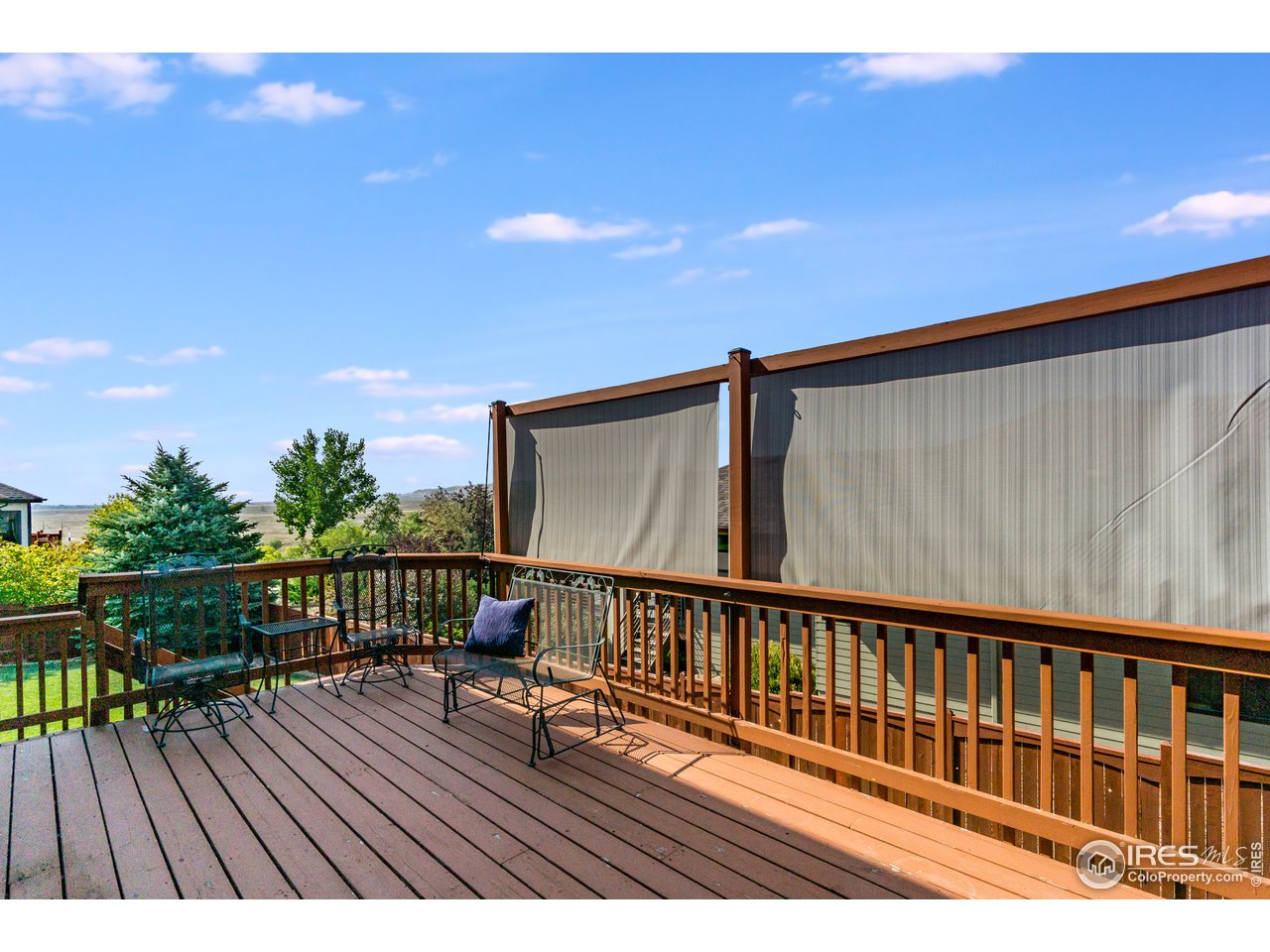 4703 Prairie Ridge Drive Fort Collins, CO 80526 - Photo 32 of 38 Great Deck w/ Sun Shades