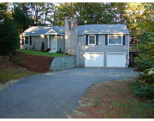 37 Kent Road Westminster, MA 01473 - Photo 1 of 19 a front view of a house with a yard and garage