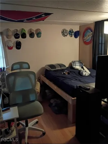 a room with furniture and musical instruments