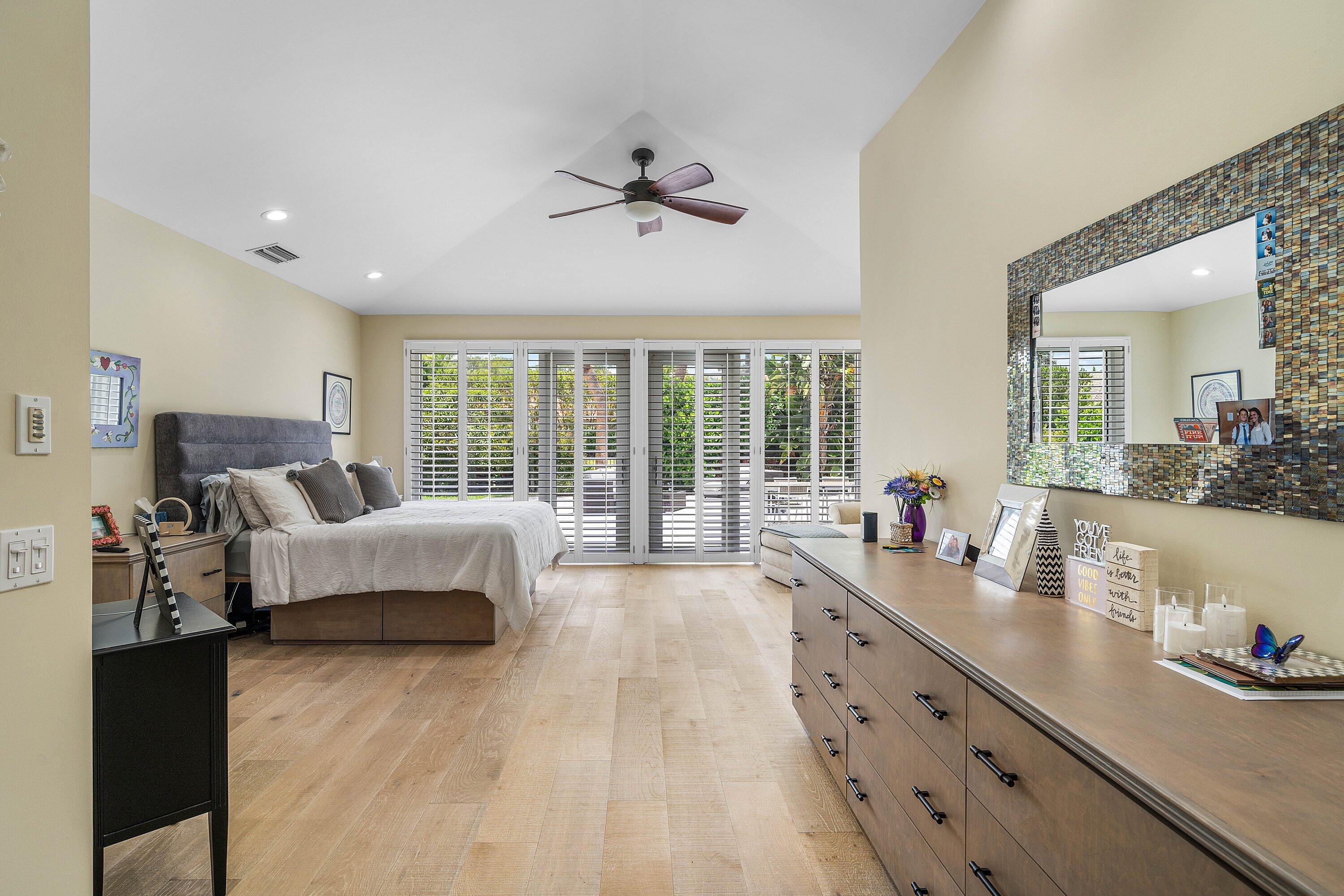 2357 Northwest 59th Street Boca Raton, FL 33496 - Photo 31 of 88 a spacious bedroom with bed and a large window