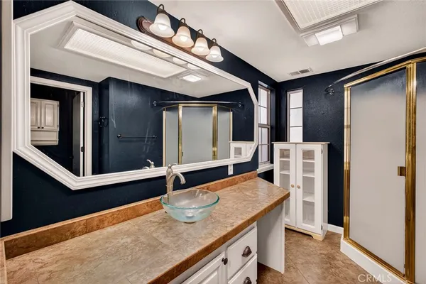 a kitchen with sink and window