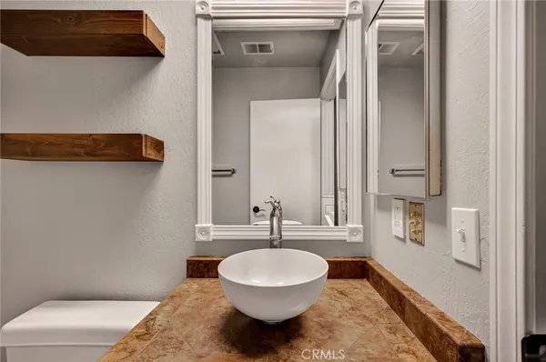 a bathroom with a shower and a shower
