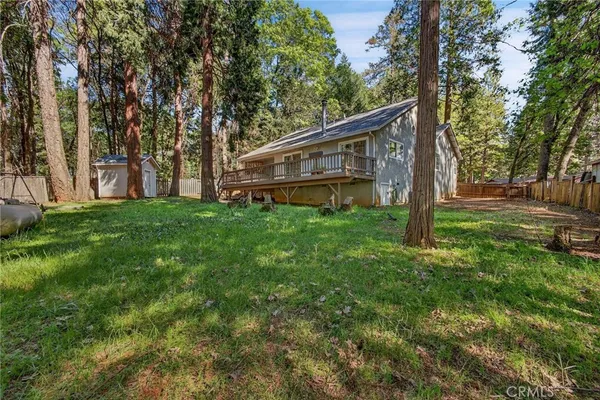 a backyard of a house with lots of green space