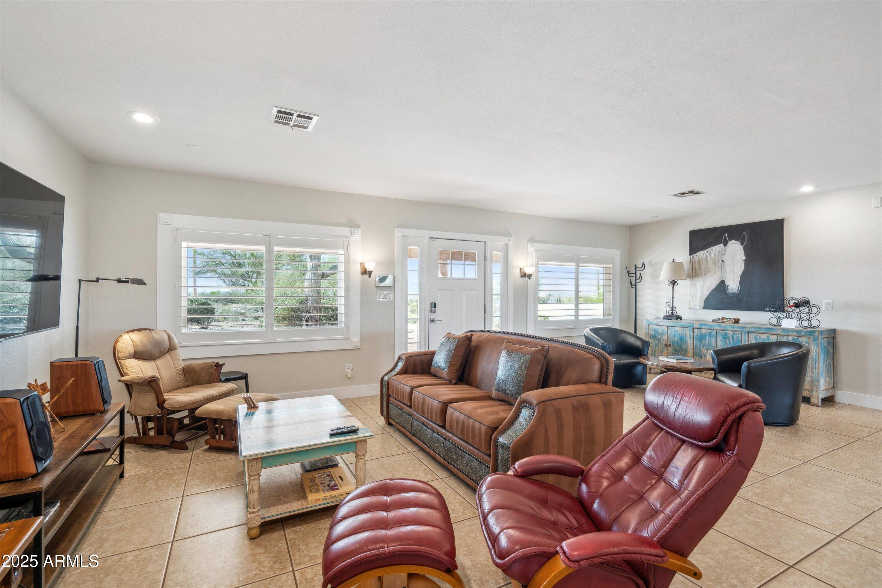 7080 East Arroyo Road Cave Creek, AZ 85331 - Photo 10 of 50 a living room with furniture floor and window