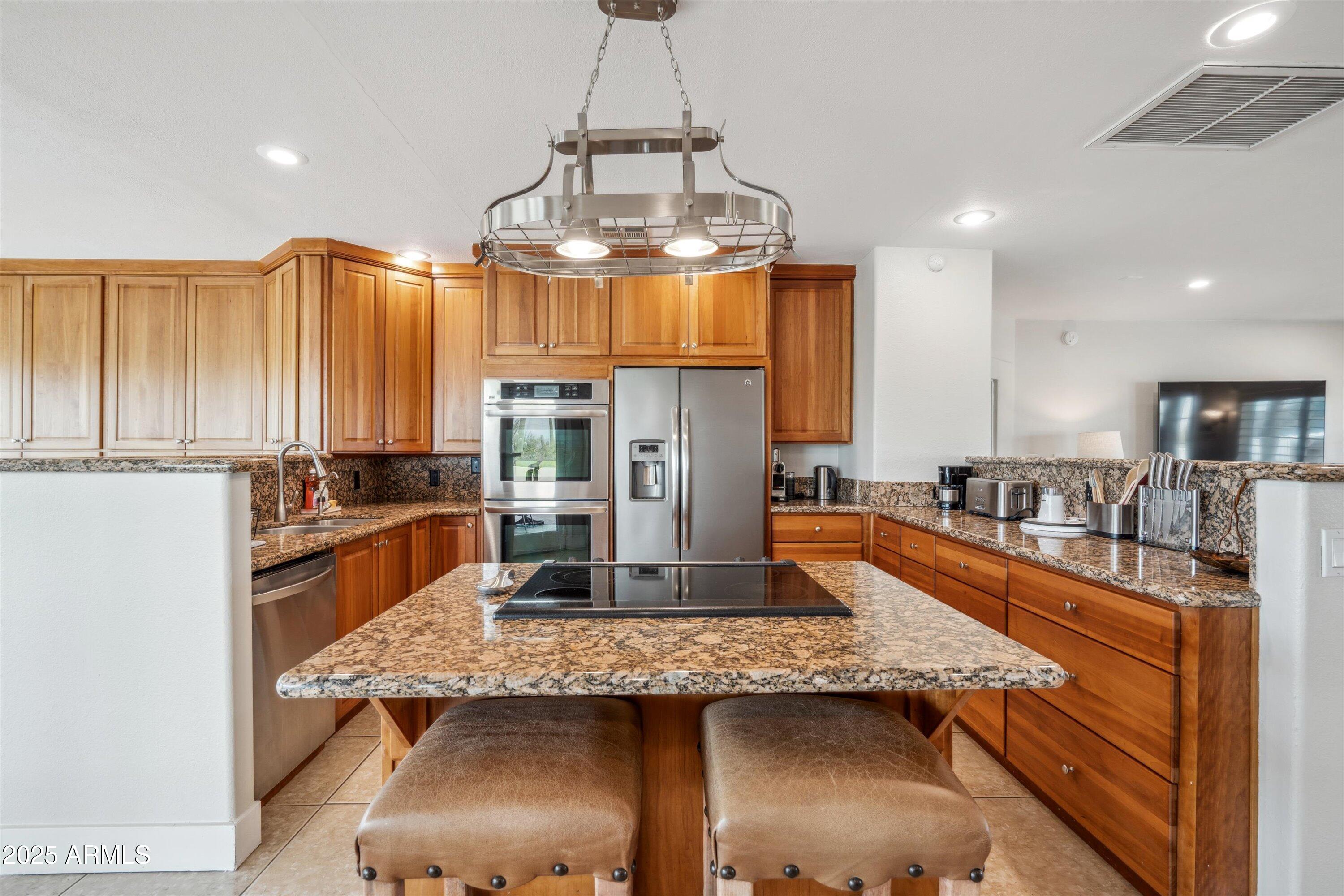 7080 East Arroyo Road Cave Creek, AZ 85331 - Photo 13 of 50 a kitchen with granite countertop lots of counter top space