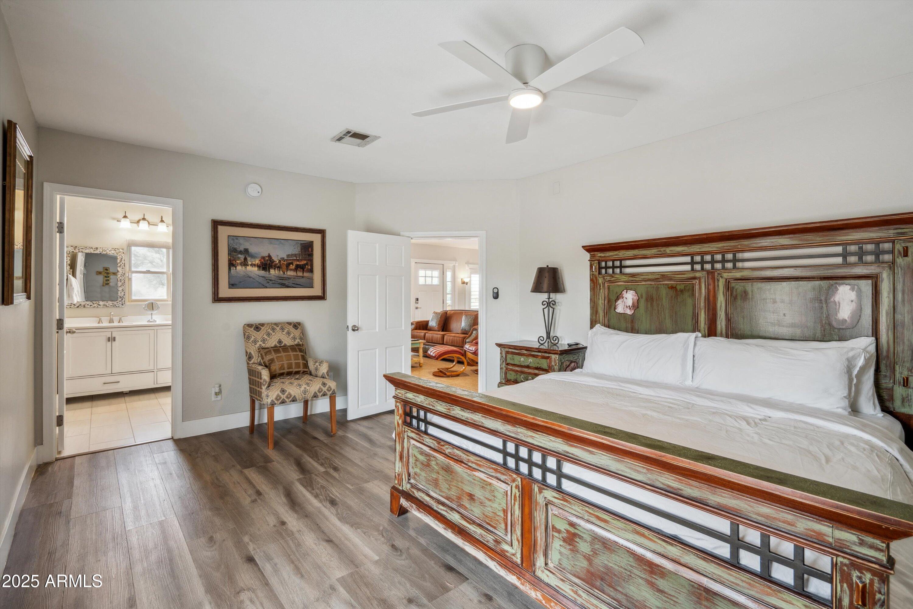 7080 East Arroyo Road Cave Creek, AZ 85331 - Photo 20 of 50 a bedroom with a bed and a table