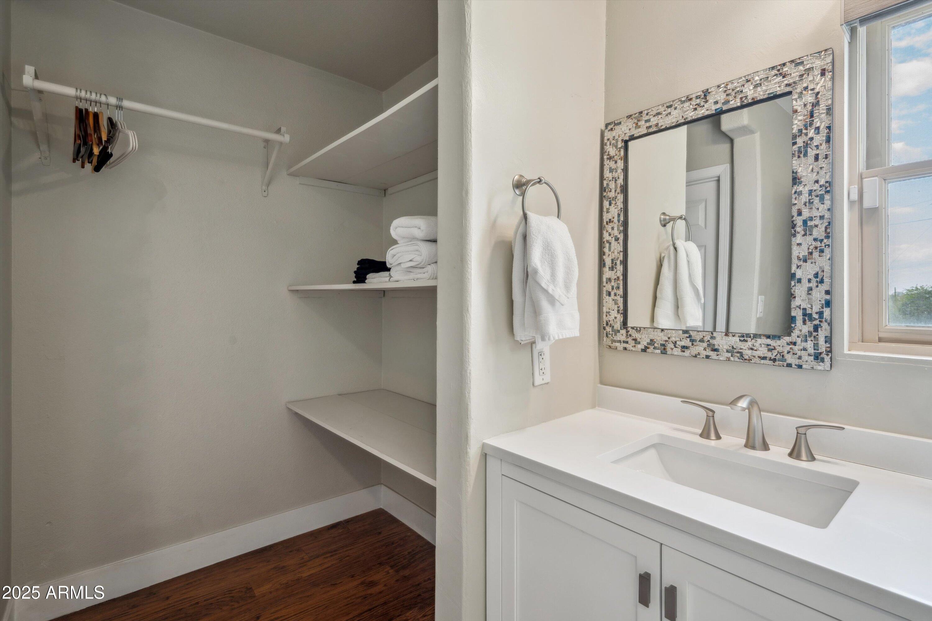 7080 East Arroyo Road Cave Creek, AZ 85331 - Photo 24 of 50 a bathroom with a sink and mirror